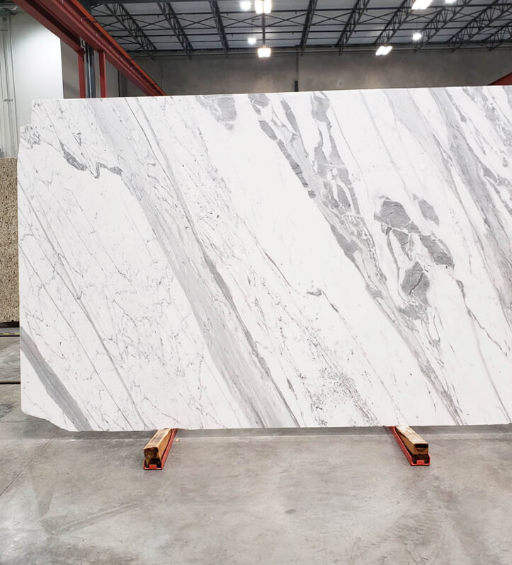 Large white stone slab with natural grey veining